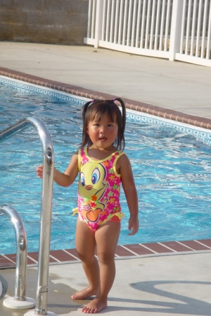 Kasen posing by the pool